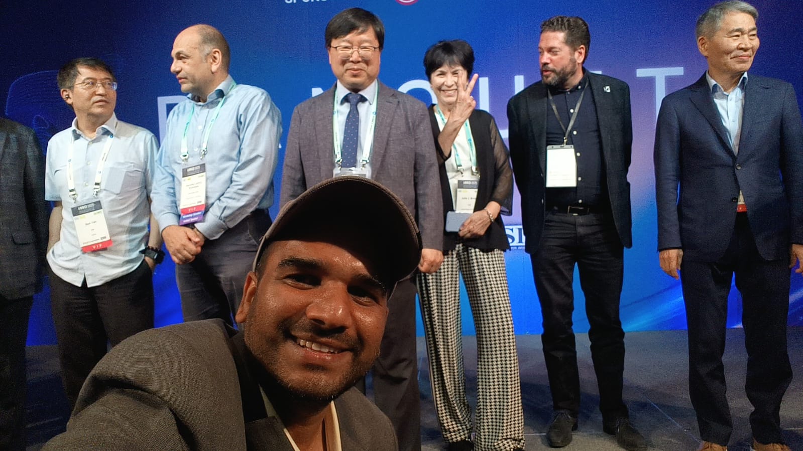 Team selfie at IMID 2025